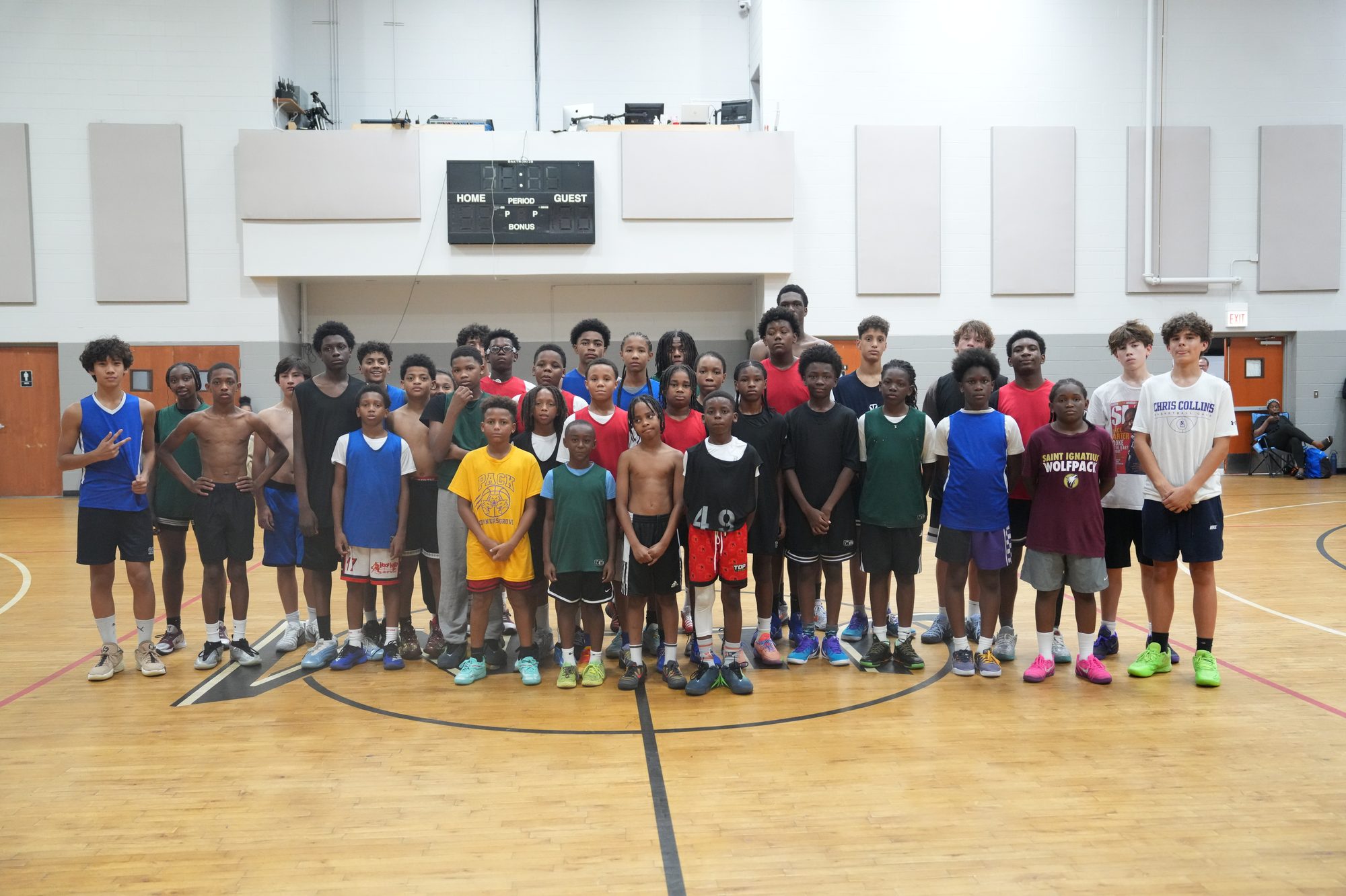 BLUEprint Hoops TRUE BLUE youth basketball players together at center court in Chicago